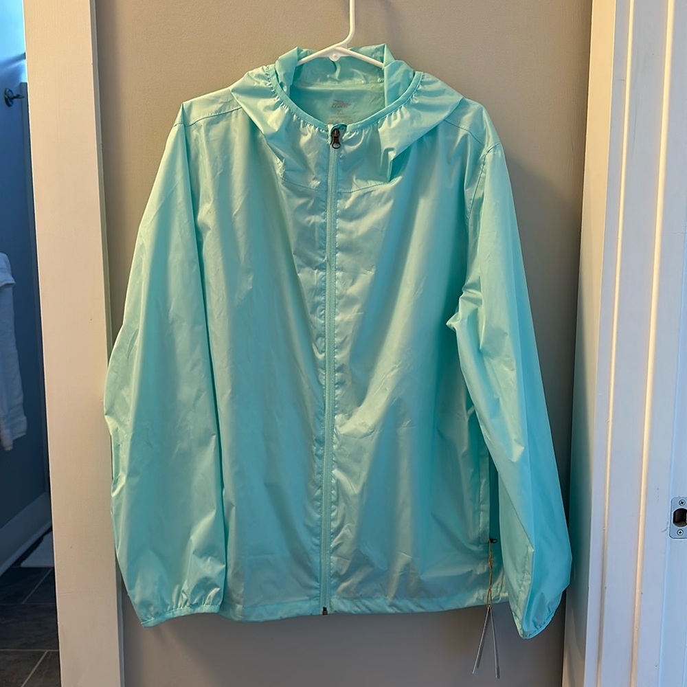 Crane, XL Ladies packable rain jacket, new with tags, lightweight.